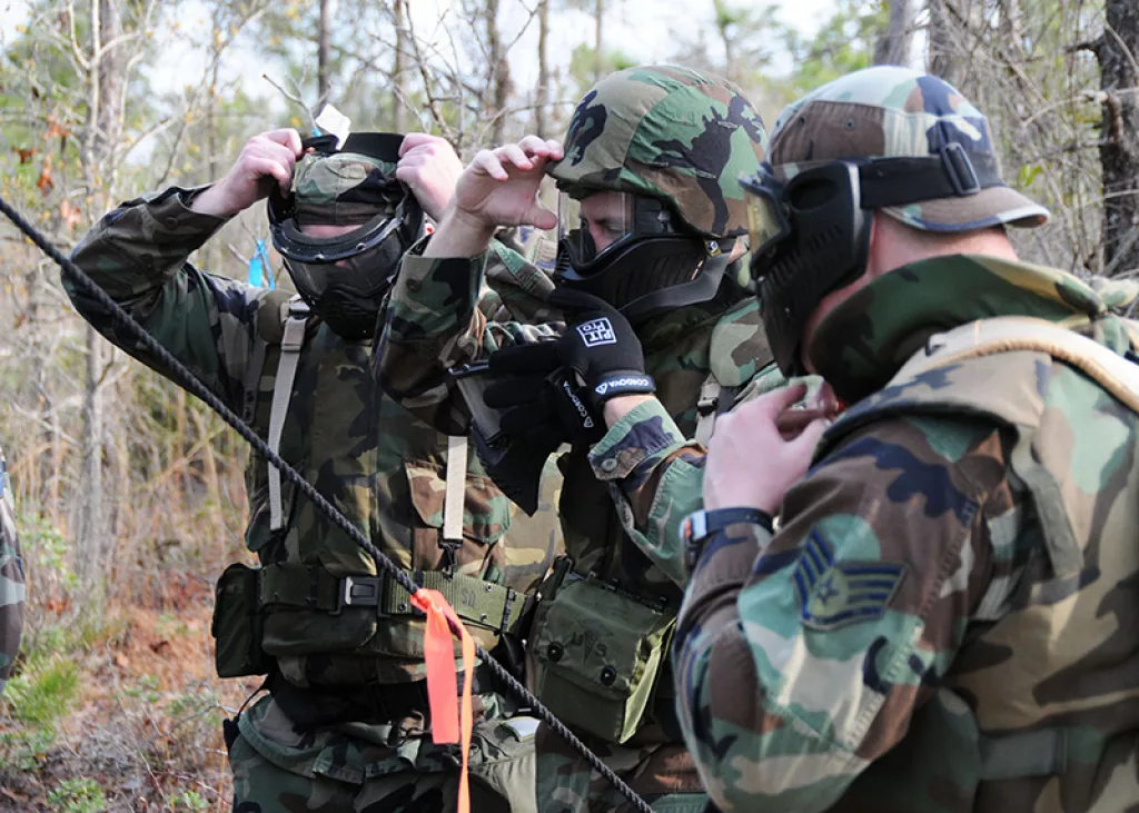 You don't need all of this tactical equipment play paintball, but it helps deal with the uneven terrain of woodsball.