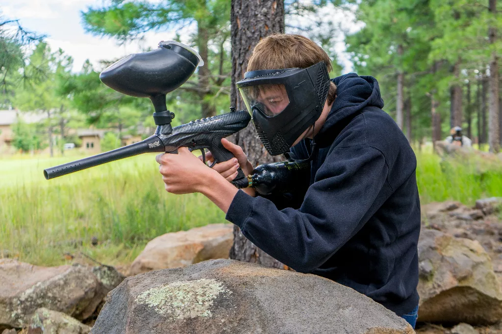 A thick layer of clothing will lessen the sting of paintball impacts. Loose clothing is better than form-fitting gear because it absorbs energy better.